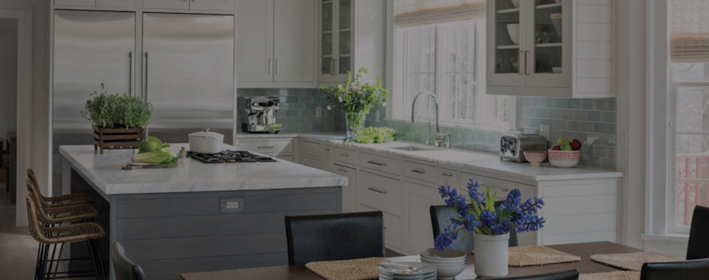 blurred gray and white kitchen