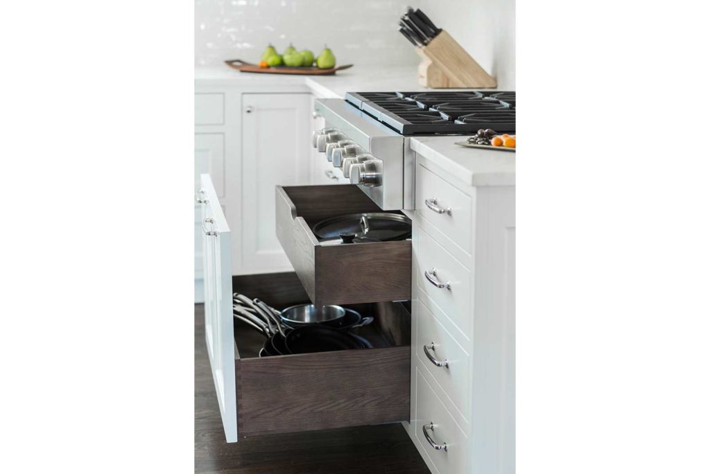white kitchen drawers with storage solutions