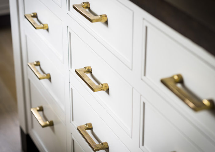brass handles on cabinets