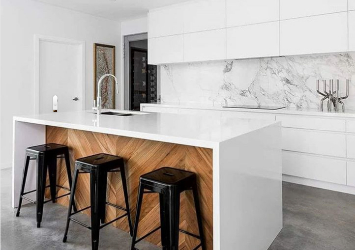 chevron wood kitchen island in white kitchen
