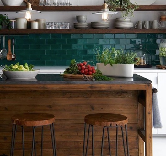 kitchen with green backsplash