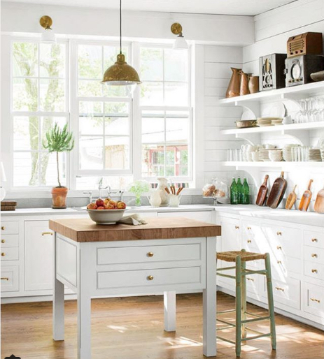 white kitchen with movable island