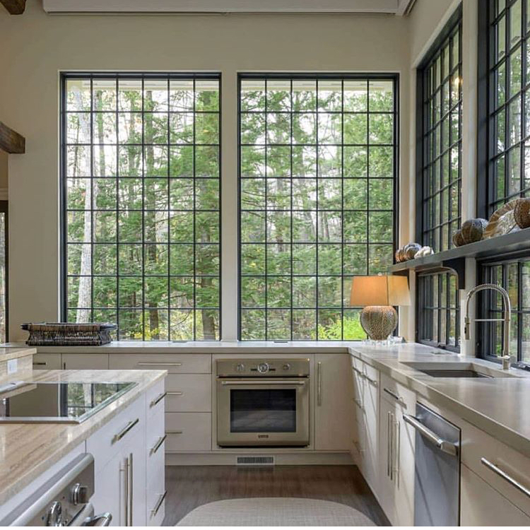 white kitchen with very large windows