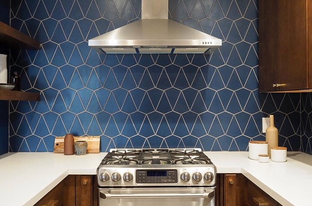 blue and white tiled backsplash in kitchen