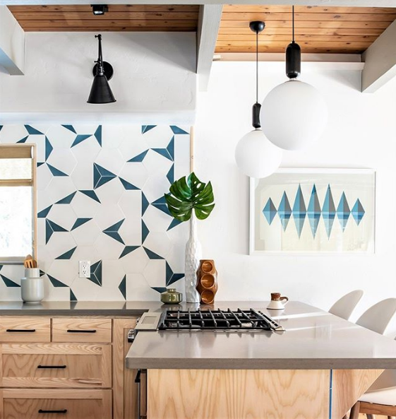 geometric backsplash and artwork in kitchen