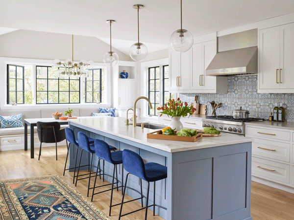 blue and white transitional kitchen with island