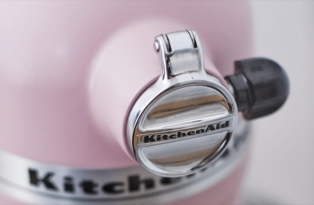 pink kitchen aid mixer close up