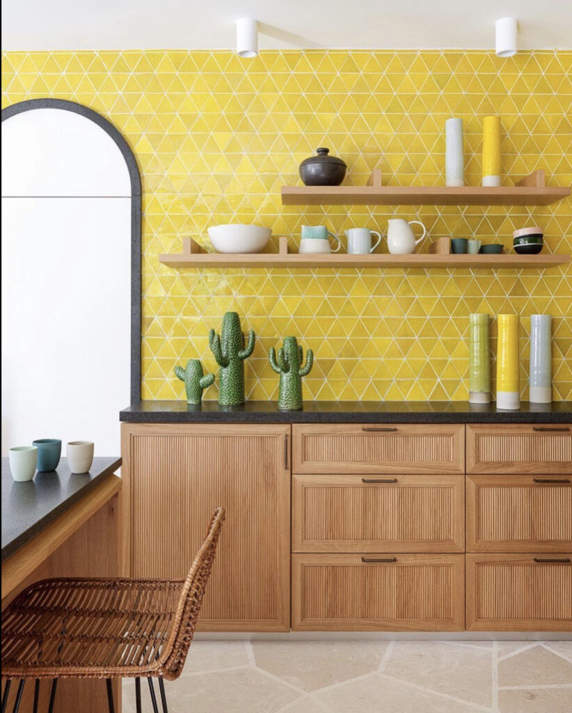 yellow tiled backsplash in kitchen