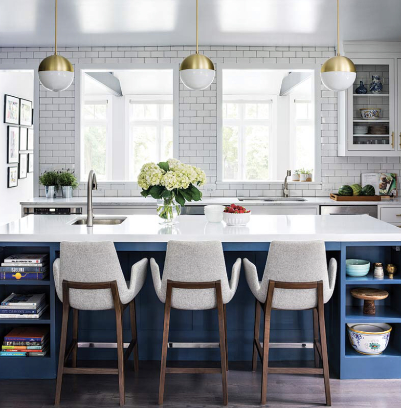 blue and white kitchen with brass details
