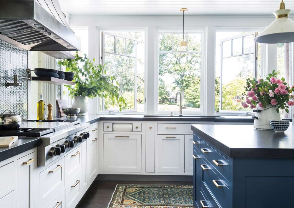 blue and white kitchen with large windows