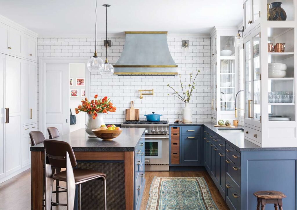 blue and white kitchen cabinets and range