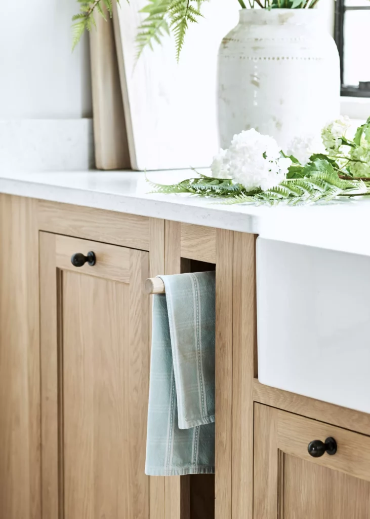 wood kitchen cabinet with pull out dish towel holder