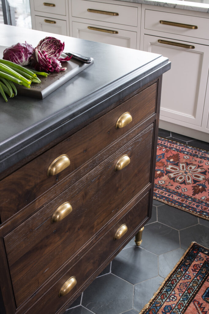 dark wood drawers with brass handles